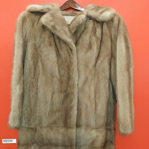 Mink dinner coat.